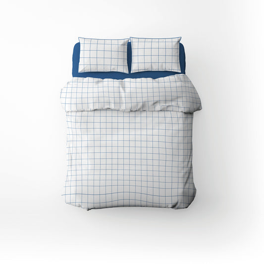 <p>Housse de couette + taie d'oreiller satin de coton - Carreaux minimalistes Blanc / Bleu</p>