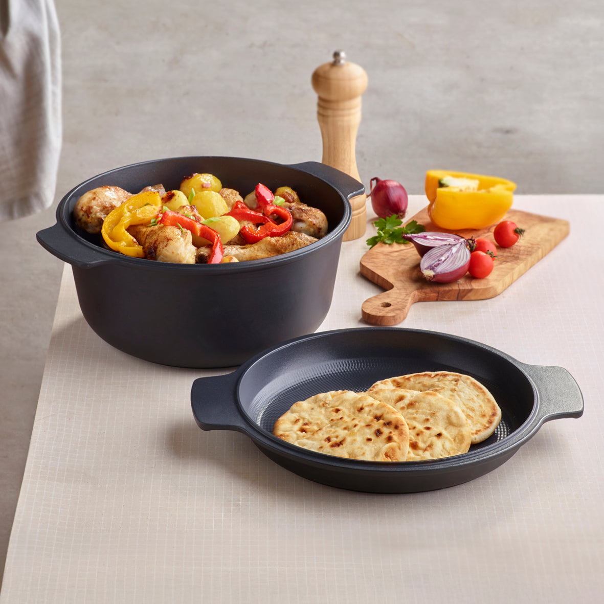 Enamelled cast iron casserole with multifunctional lid - black - 26 cm