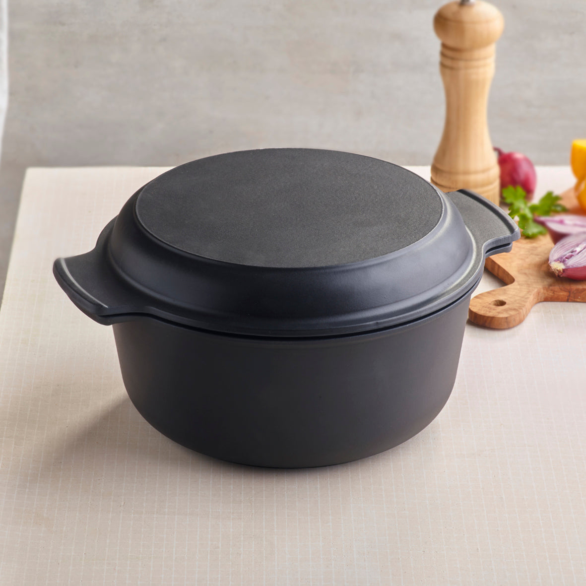 Enamelled cast iron casserole with multifunctional lid - black - 26 cm