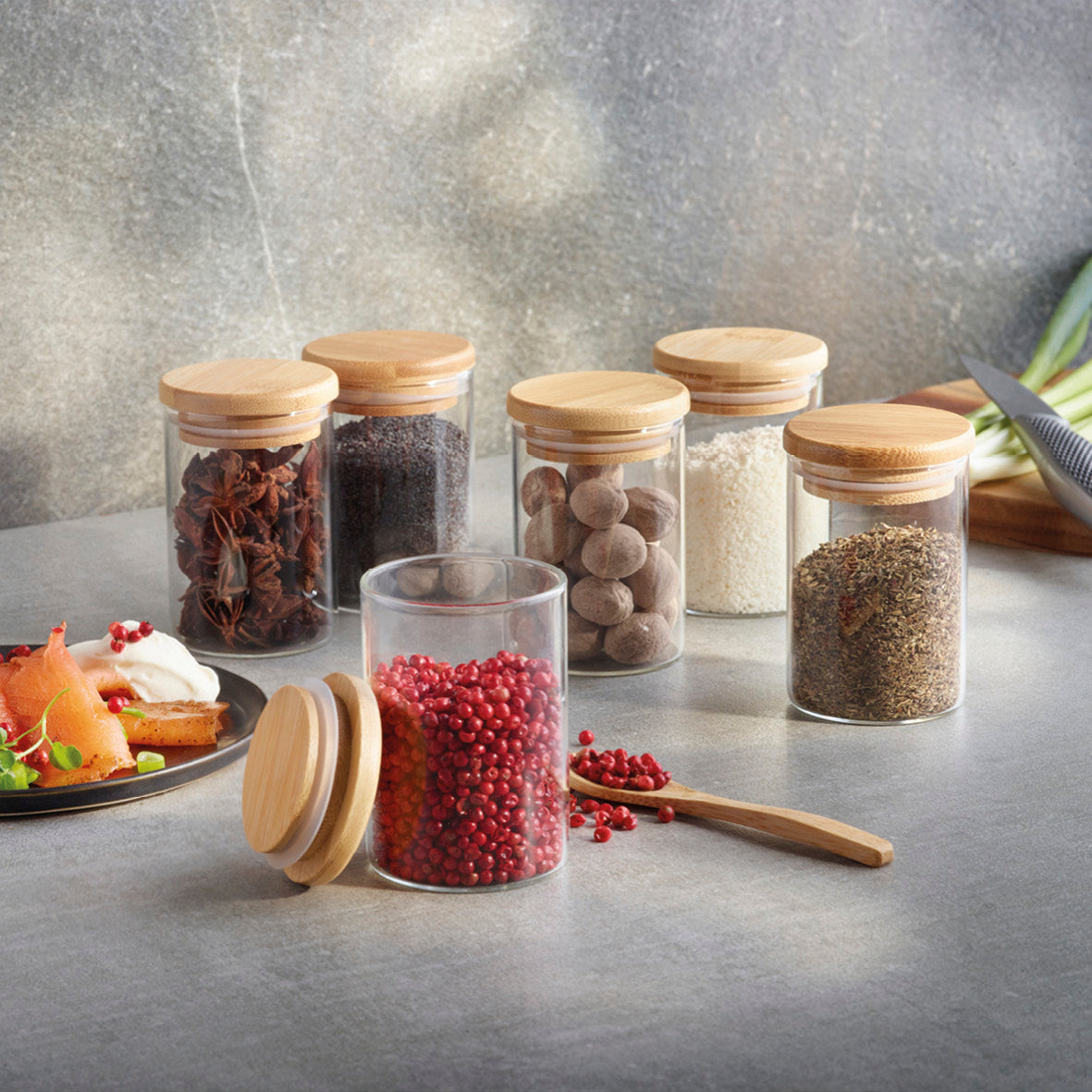 Set of small glass spice jars with bamboo lid